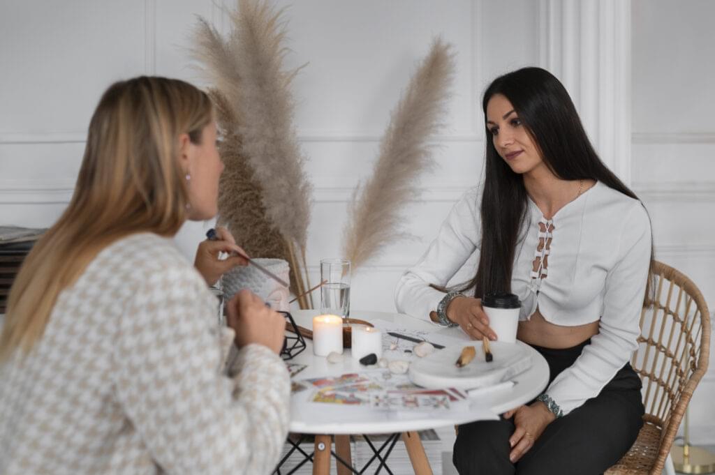 side-view-woman-reading-tarot (1) Health and Wellness Astrology